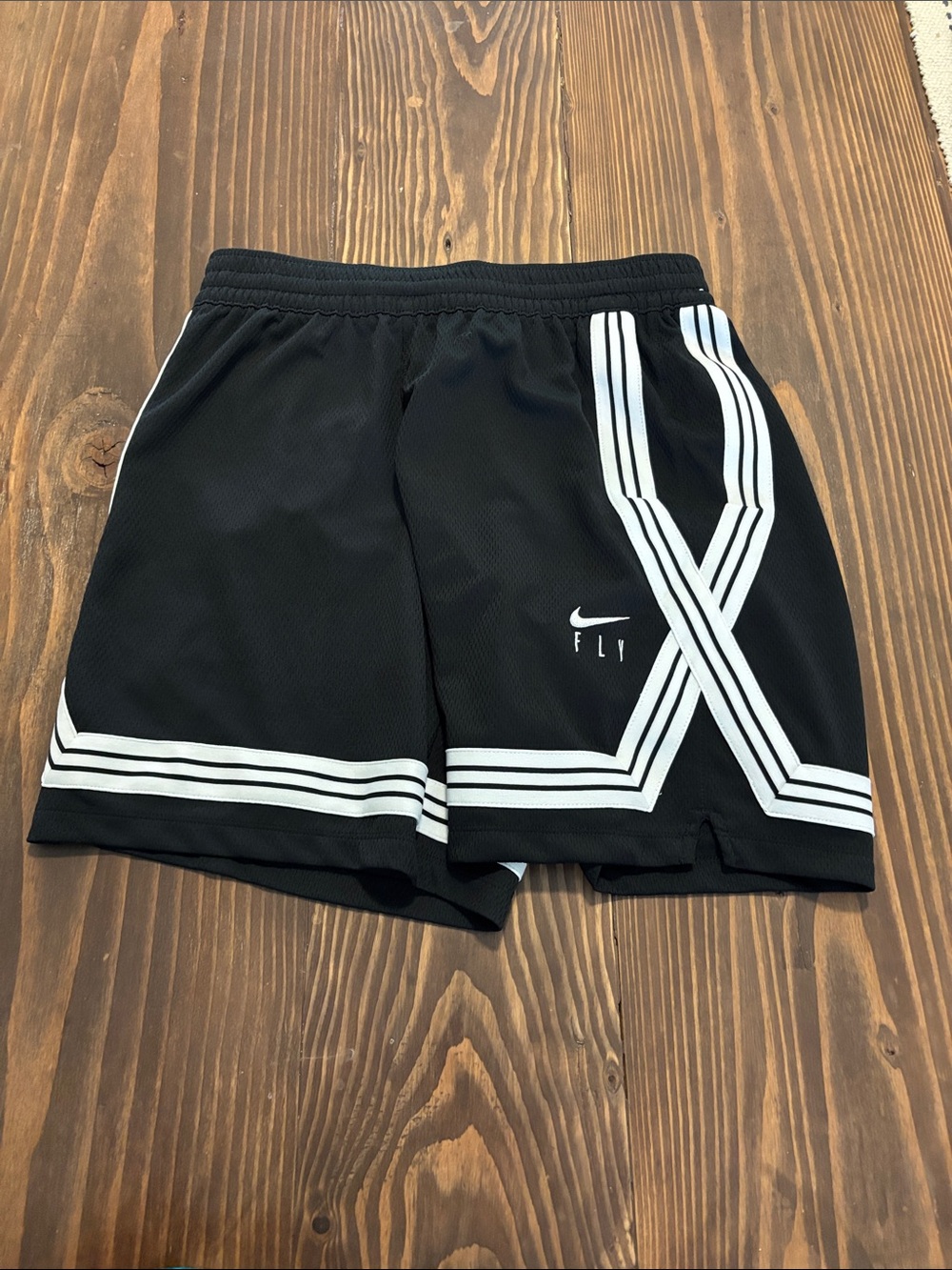 Nike Black Athletic Shorts with White Stripe Accent
